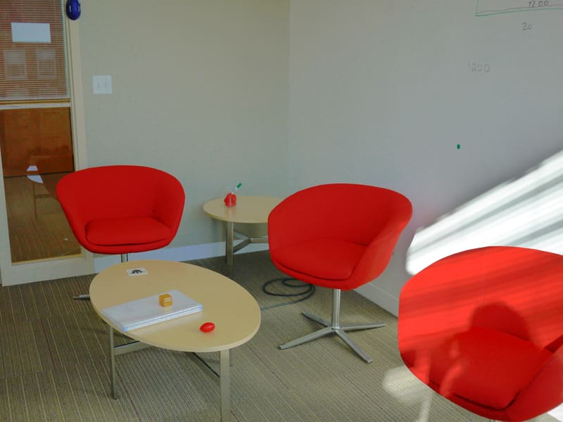 Red chairs in the new lab meeting area