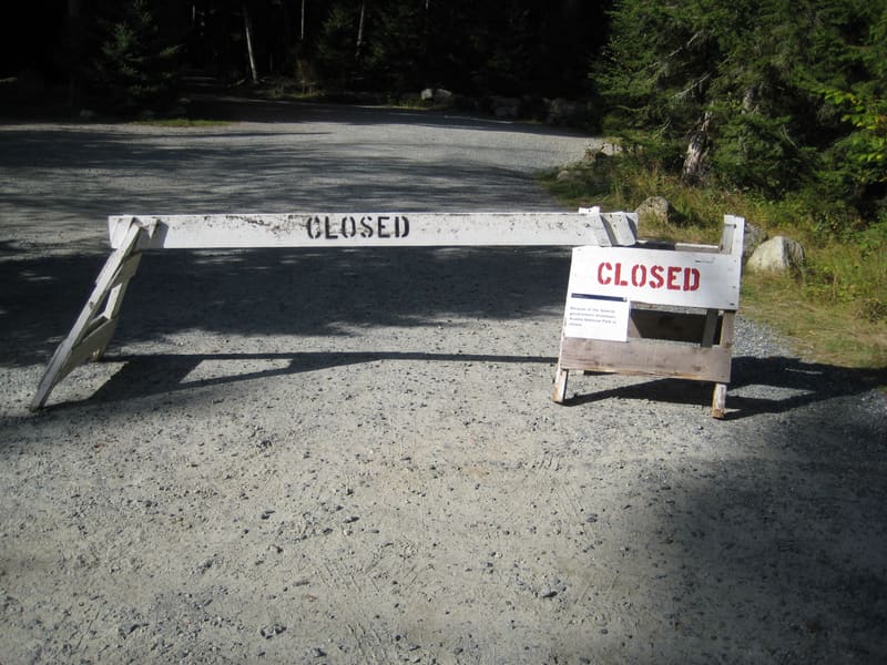 Lab members beside a road closure during the federal government shutdown