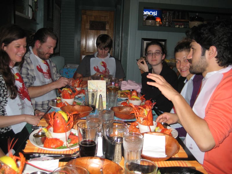 The lab gathered around the table for a lobster dinner