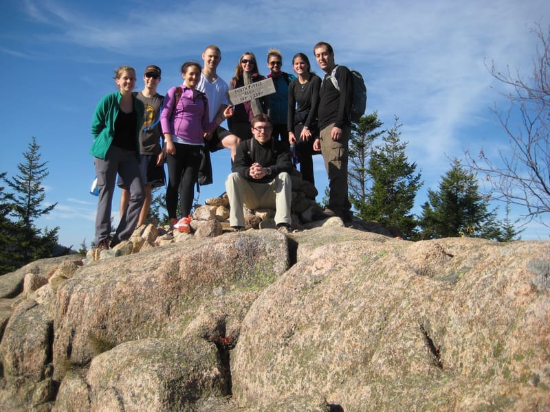 Lab members gathered on a rocky summit during the retreat hike