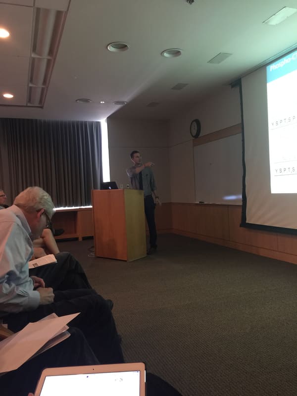 Kevin presenting his research during his thesis defense