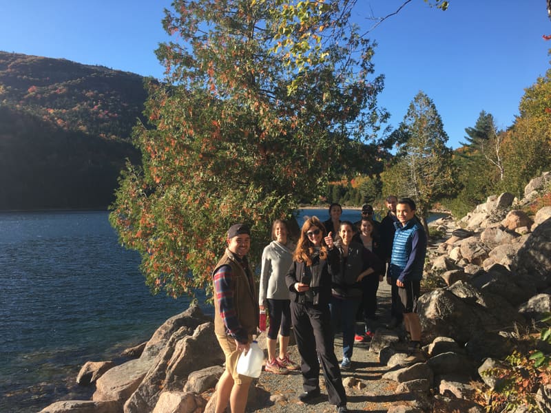 Churchman Lab standing beside Jordan Pond during the retreat hike