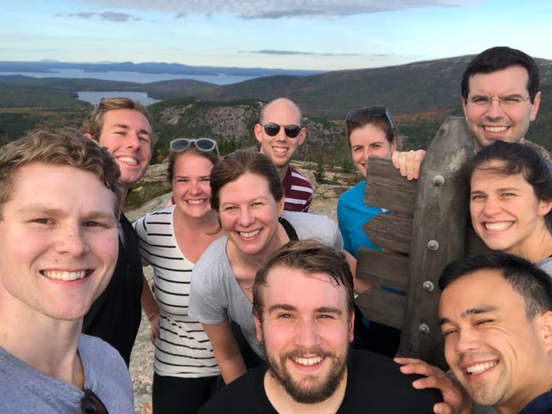 Lab members crowding together for a retreat selfie
