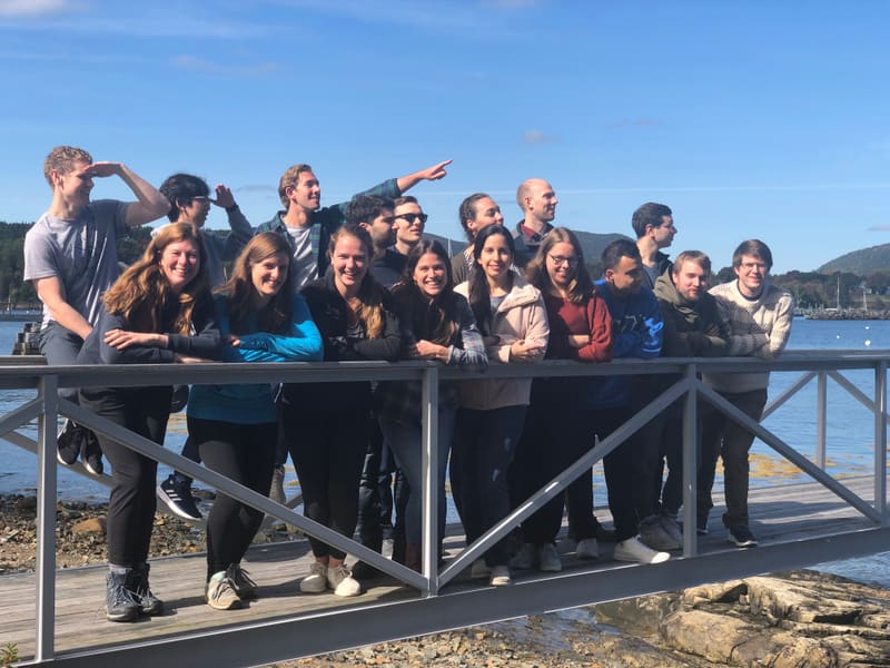 Churchman Lab group portrait at a mountain overlook