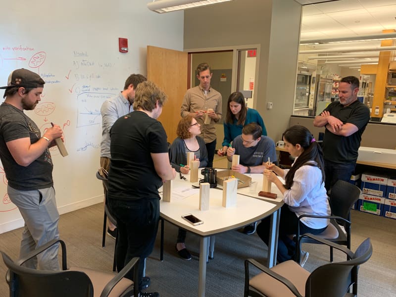 Churchman Lab members preparing together on Blake’s defense day