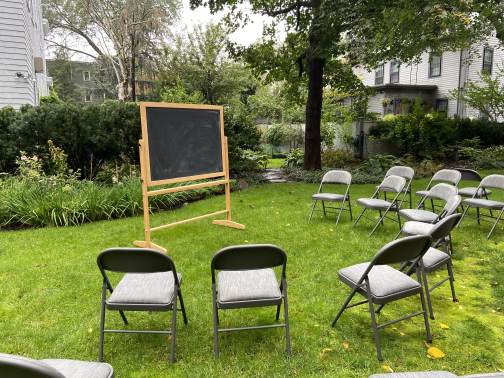 The outdoor chalkboard and chairs ready for a retreat session