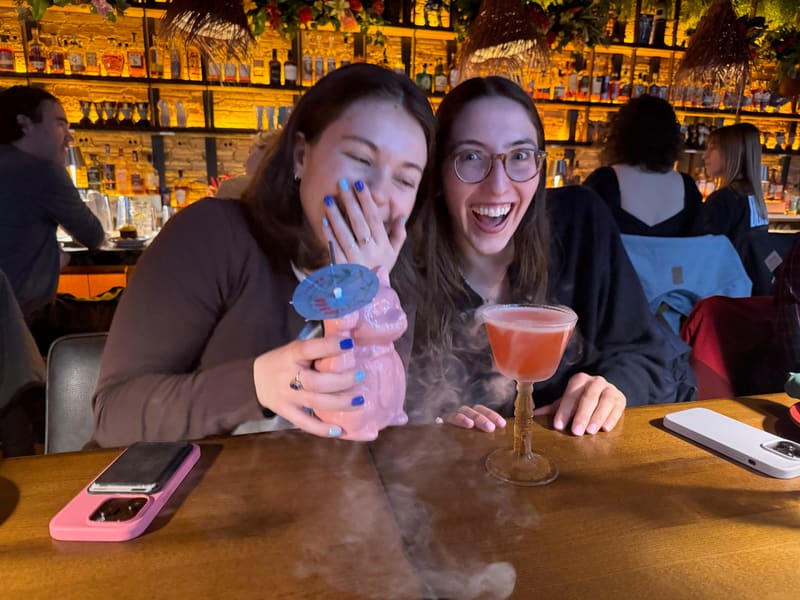 Claire and Lisa laughing together at their candidate dinner
