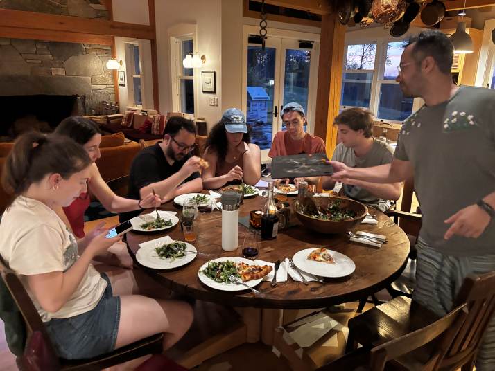 The lab gathered around the farmhouse table for dinner