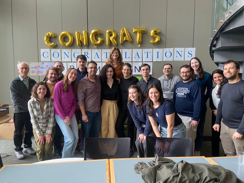 Hope celebrating with friends and colleagues after her PhD defense