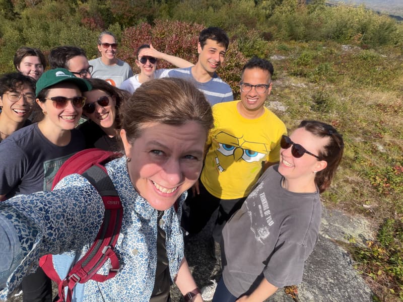 Lab members taking a group selfie during the retreat hike